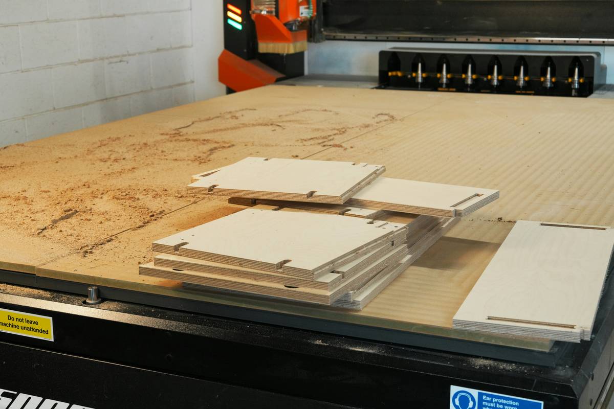 hooked on wood router lift installed in custom router table showing smooth height adjustment mechanism